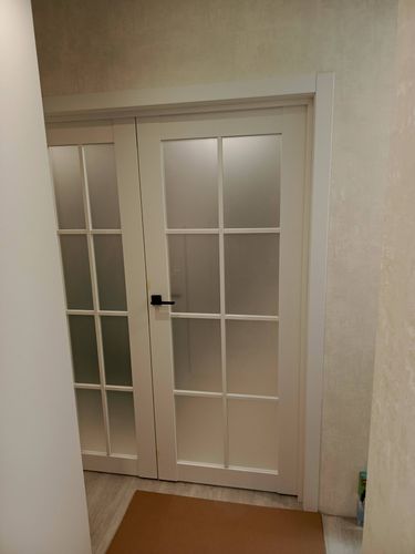 Установка межкомнатной двухстворчатой двери