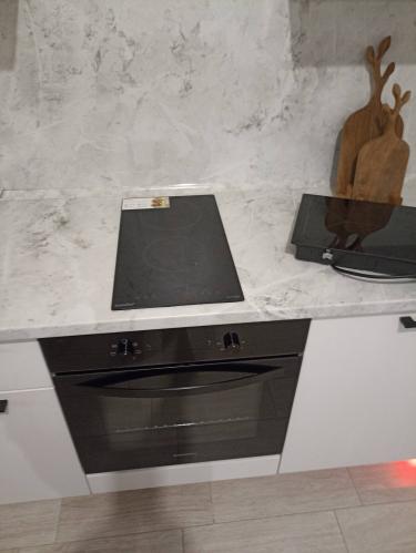 Установка и подключение электрической варочной поверхности Демонтаж варочной панели с сохранением Выезд мастера за пределы зоны бесплатного выезда