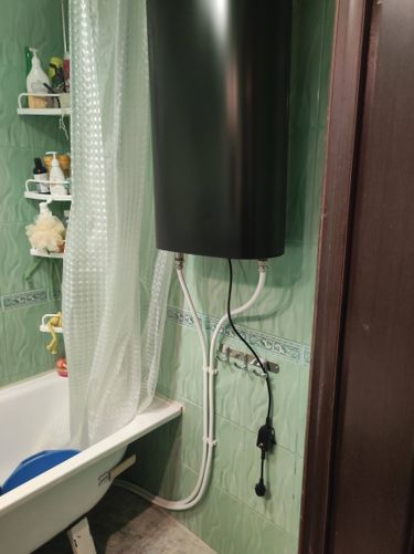 Установка электрического проточного водонагревателя