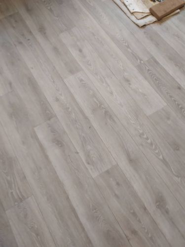 Укладка линолеума на клей более 15 кв.м