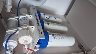 Замена картриджа в системе фильтрации