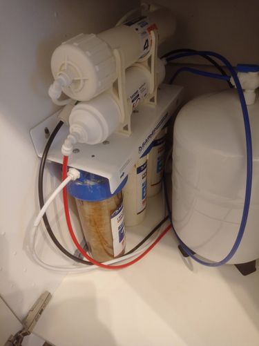 Замена картриджа в системе фильтрации