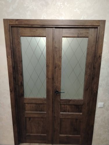 Установка межкомнатной двухстворчатой двери