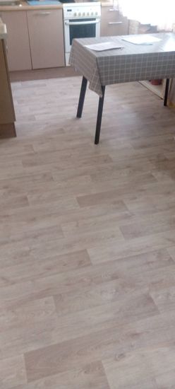 Укладка линолеума на клей более 15 кв.м