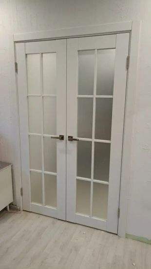 Установка межкомнатной двухстворчатой двери