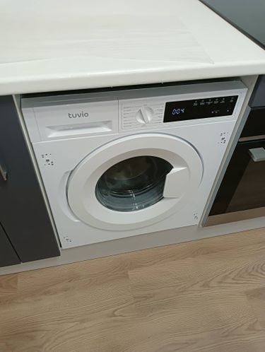 Установка и подключение встраиваемой стиральной машины