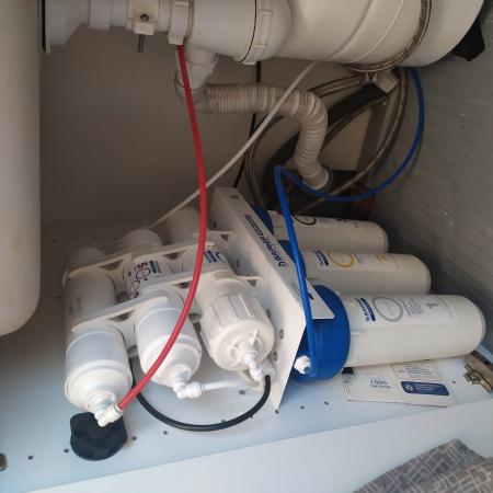 Замена картриджа в системе фильтрации