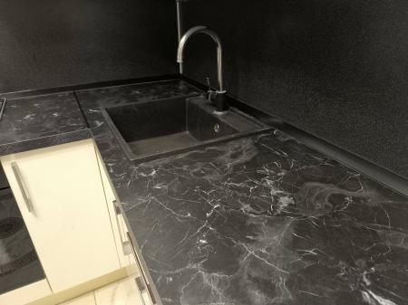 Установка столешницы ДСП Установка и подключение врезной мойки Выезд мастера за пределы зоны бесплатного выезда