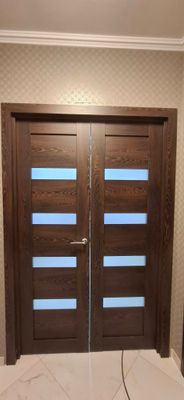 Установка межкомнатной двухстворчатой двери