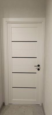 Установка межкомнатной двухстворчатой двери