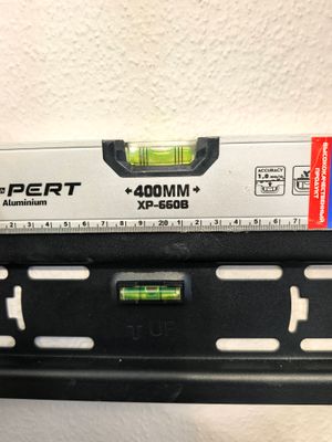 Установка кронштейна под ТВ на стену