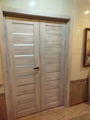 Установка межкомнатной двухстворчатой двери
