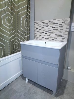 Установка раковины с тумбой