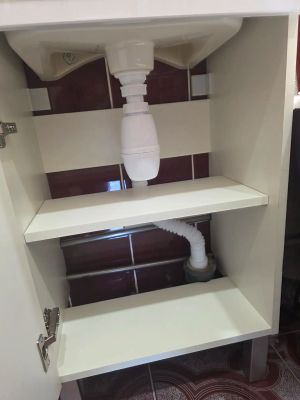 Установка раковины с тумбой
