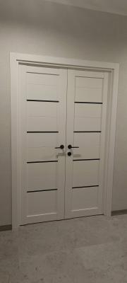 Установка межкомнатной двухстворчатой двери