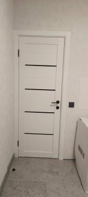 Установка межкомнатной двухстворчатой двери