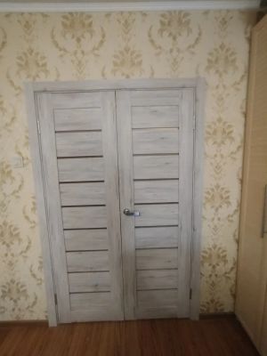 Установка межкомнатной двухстворчатой двери