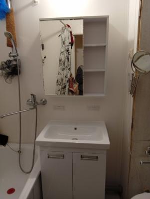 Установка раковины с тумбой