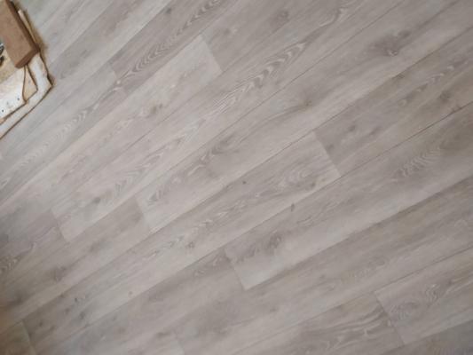 Укладка линолеума на клей более 15 кв.м