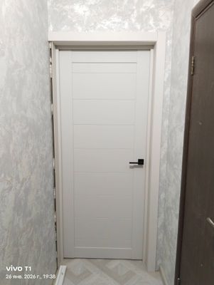 Установка межкомнатной двухстворчатой двери