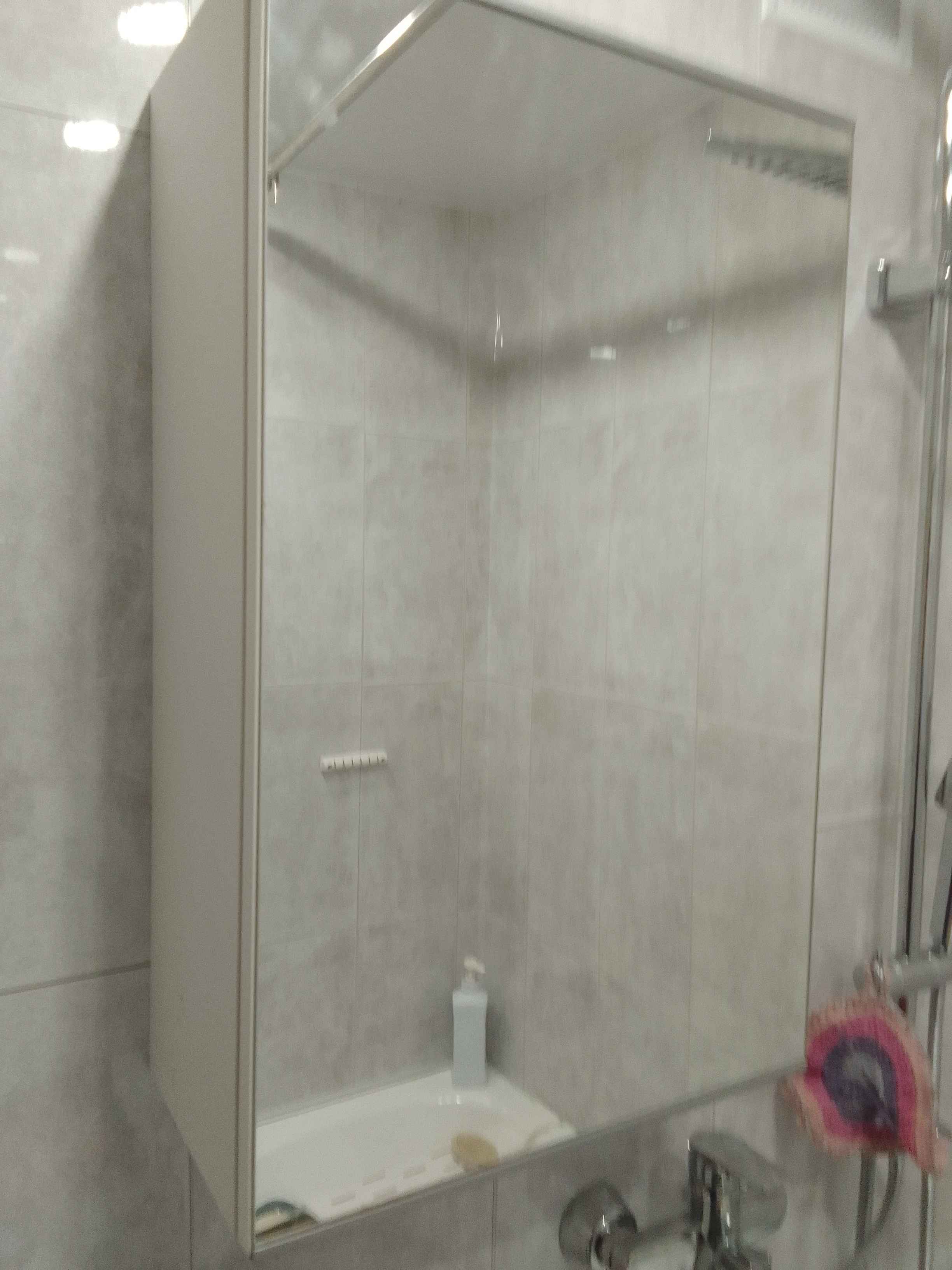 Сборка и навеска зеркального шкафа в ванной комнате